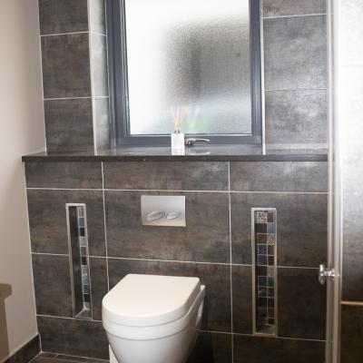 Contemporary bathroom remodel Dark Tile Bathroom remodel